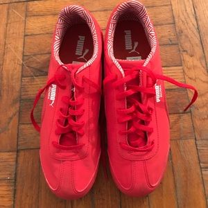 Red puma sneakers